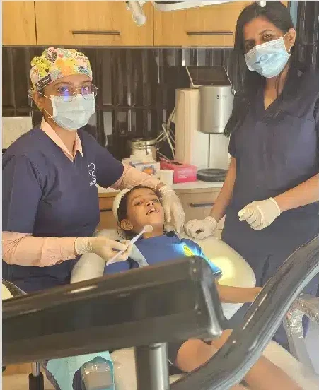 Child receiving gentle care from the best pediatric dentist in Thane